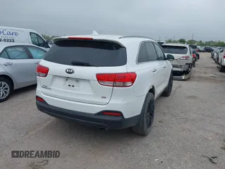 2016 Kia Sorento LX with VIN 5XYPG4A37GG055639, listed as a IAAI auction lot 41888968 with 140,431 mi miles. Bid and sale history available at carsss.com. Image 4.