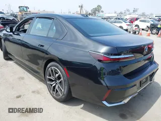2023 BMW 7 Series 740i with VIN WBA23EH02PCM14257, listed as a IAAI auction lot 42408167 with Not provided miles and . Bid and sale history available at DreamBid. Image 3.
