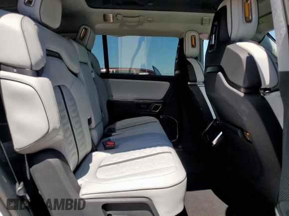 2023 Rivian R1S Launch Edition z VIN 7PDSGABL9PN010792, wystawiony jako Copart lot #56359465 z przebiegiem 24 319 mil mil oraz Szkoda całkowita • Salvage title. Historia ofert i sprzedaży dostępna na DreamBid. Obrazek 11.