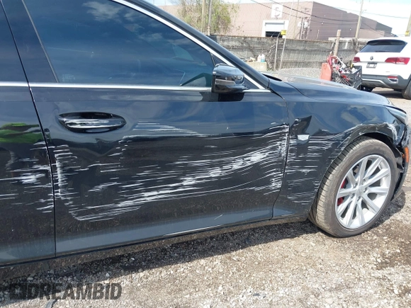 2021 Cadillac CT5 Luxury z VIN 1G6DX5RKXM0146235, wystawiony jako IAAI lot #42214676 z przebiegiem 72 847 mil mil oraz . Historia ofert i sprzedaży dostępna na DreamBid. Obrazek 19.