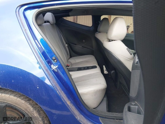 2012 Hyundai Veloster w/Black Int with VIN KMHTC6AD5CU027793, listed as a IAAI auction lot 41881333 with 134,984 mi miles. Bid and sale history available at carsss.com. Image 8.