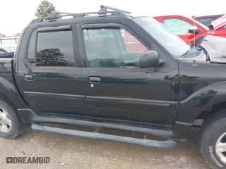2004 Ford Explorer Sport Trac XLS with VIN 1FMZU77K64UB43072, listed as a IAAI auction lot 41555127 with 175,269 mi miles. Bid and sale history available at carsss.com. Image 14.