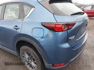 2019 Mazda CX-5 Sport with VIN JM3KFBBM5K0668678, listed as a IAAI auction lot 41811146 with 102,634 mi miles and . Bid and sale history available at DreamBid. Image 17.