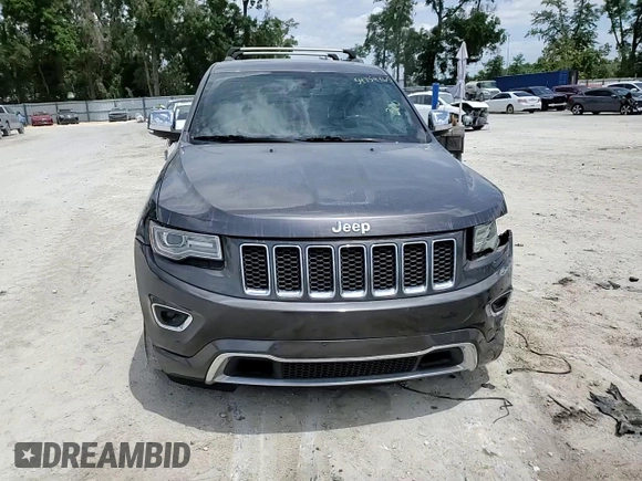2014 Jeep Grand Cherokee Overland with VIN 1C4RJFCT7EC182234, listed as a Copart auction lot 54754465 with 185,658 mi miles and Salvage Title. Bid and sale history available at DreamBid. Image 15.
