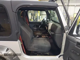 2003 Jeep Wrangler Rubicon with VIN 1J4FA69S13P375142, listed as a IAAI auction lot 41709647 with 125,443 mi miles and . Bid and sale history available at DreamBid. Image 8.