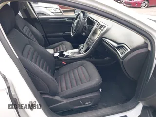 2016 Ford Fusion SE z VIN 3FA6P0H76GR142179, wystawiony jako IAAI lot #42181060 z przebiegiem 73 837 mil mil oraz . Historia ofert i sprzedaży dostępna na DreamBid. Obrazek 5.
