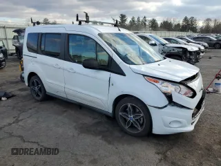 2016 Ford Transit Connect XLT with VIN NM0AE8F7XG1234396, listed as a Copart auction lot 83246404 with 82,787 mi miles and Salvage title. Bid and sale history available at DreamBid. Image 4.