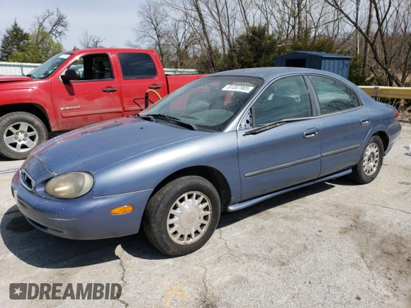 1999 Mercury Sable GS with VIN 1MEFM50U1XA653292, listed as a Copart auction lot 51307905 with 210,945 mi miles and Salvage title. Bid and sale history available at DreamBid. Image 1.