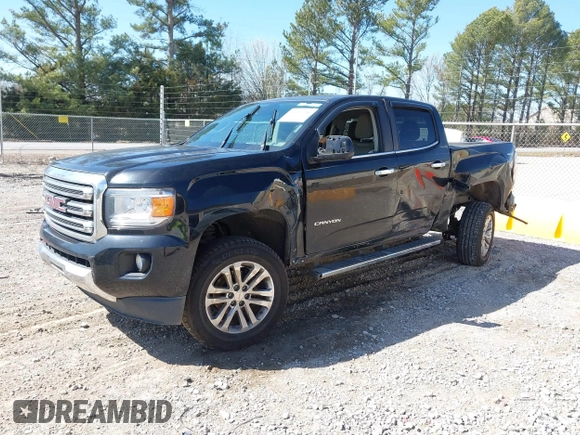 2015 GMC Canyon 2WD SLT with VIN 1GTG5CE35F1249224, listed as a IAAI auction lot 41697796 with 180,230 mi miles. Bid and sale history available at carsss.com. Image 17.