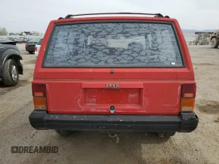 1993 Jeep Cherokee SE with VIN 1J4FT27P2PL619945, listed as a Copart auction lot 59053465 with 222,336 mi miles and Clean title. Bid and sale history available at DreamBid. Image 6.
