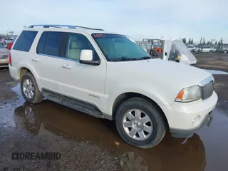 2003 Lincoln Aviator Premium z VIN 5LMEU78H43ZJ20308, wystawiony jako IAAI lot #41777982 z przebiegiem 160 989 mil mil oraz . Historia ofert i sprzedaży dostępna na DreamBid. Obrazek 1.