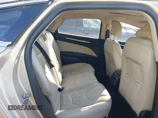 2017 Ford Fusion Titanium with VIN 3FA6P0K91HR309740, listed as a IAAI auction lot 41373824 with 95,499 mi miles and . Bid and sale history available at DreamBid. Image 8.