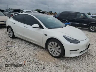 2021 Tesla Model 3 Long Range with VIN 5YJ3E1EB8MF079732, listed as a Copart auction lot 54683445 with 98,504 mi miles and Salvage Title. Bid and sale history available at DreamBid. Image 4.