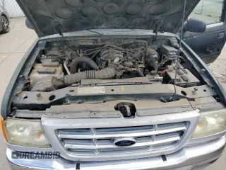 2001 Ford Ranger XLT Appearance with VIN 1FTYR14EX1PB55314, listed as a Copart auction lot 52887535 with 102,270 mi miles and Salvage Title. Bid and sale history available at DreamBid. Image 11.