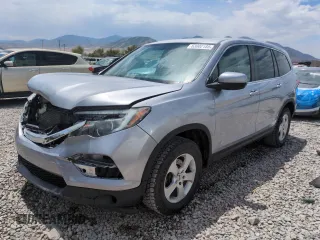 2018 Honda Pilot EX-L with VIN 5FNYF6H59JB047972, listed as a Copart auction lot 63002185 with 229,757 mi miles and Salvage title. Bid and sale history available at DreamBid. Image 1.