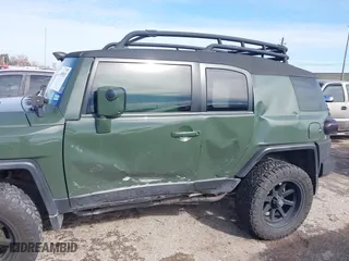 2014 Toyota FJ Cruiser with VIN JTEBU4BFXEK192640, listed as a IAAI auction lot 41349553 with 49,308 mi miles. Bid and sale history available at carsss.com. Image 6.