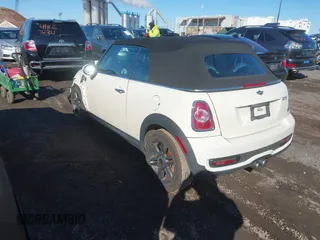 2011 MINI Convertible S with VIN WMWZP3C54BTX82748, listed as a IAAI auction lot 41817396 with 113,458 mi miles and . Bid and sale history available at DreamBid. Image 3.
