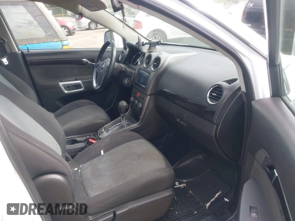 2014 Chevrolet Captiva Sport LS z VIN 3GNAL2EK7ES547033, wystawiony jako IAAI lot #42206186 z przebiegiem 196 530 mil mil oraz . Historia ofert i sprzedaży dostępna na DreamBid. Obrazek 5.