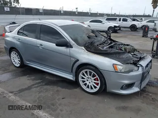 2011 Mitsubishi Lancer Evolution GSR z VIN JA32W8FV6BU046340, wystawiony jako IAAI lot #42118935 z przebiegiem Nie podano mil oraz . Historia ofert i sprzedaży dostępna na DreamBid. Obrazek 1.