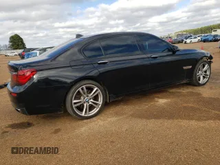 2015 BMW 7 Series 740Li with VIN WBAYE4C55FD947147, listed as a Copart auction lot 43274705 with 194,914 mi miles and Salvage Title. Bid and sale history available at DreamBid. Image 3.