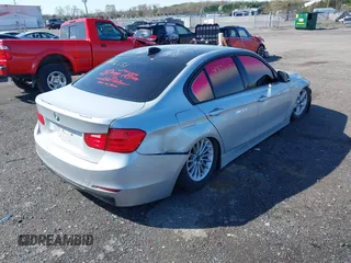 2012 BMW 3 Series 328i with VIN WBA3A5C55CFJ89595, listed as a IAAI auction lot 41926151 with 210,946 mi miles. Bid and sale history available at carsss.com. Image 4.