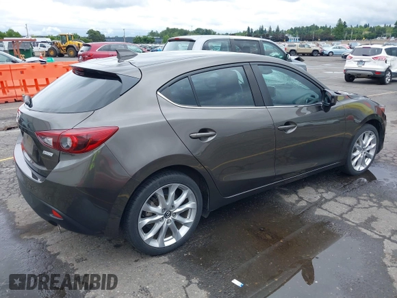 2014 Mazda 3 S Grand Touring with VIN JM1BM1M3XE1164610, listed as a IAAI auction lot 42421946 with 96,591 mi miles and . Bid and sale history available at DreamBid. Image 4.