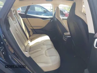 2013 Tesla Model S z VIN 5YJSA1CN5DFP20579, wystawiony jako IAAI lot #41983339 z przebiegiem 80 118 mil mil oraz . Historia ofert i sprzedaży dostępna na DreamBid. Obrazek 8.