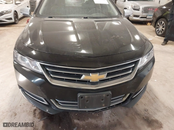 2015 Chevrolet Impala LTZ with VIN 2G1165S38F9145916, listed as a IAAI auction lot 41982242 with 303,316 mi miles. Bid and sale history available at carsss.com. Image 12.