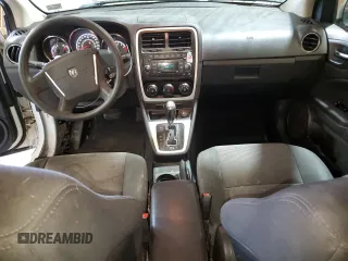 2011 Dodge Caliber Heat z VIN 1B3CB5HA6BD222153, wystawiony jako Copart lot #56881205 z przebiegiem 153 950 mil mil oraz Szkody całkowita. Historia ofert i sprzedaży dostępna na DreamBid. Obrazek 8.