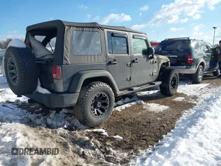 2017 Jeep Wrangler Unlimited Sport with VIN 1C4BJWDG7HL645433, listed as a IAAI auction lot 41240538 with 132,100 mi miles. Bid and sale history available at carsss.com. Image 4.