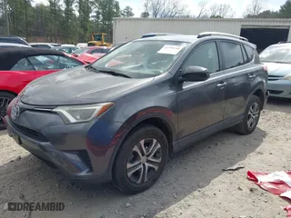 2016 Toyota RAV4 LE with VIN JTMZFREV2GJ092537, listed as a IAAI auction lot 41794148 with 145,678 mi miles. Bid and sale history available at carsss.com. Image 2.