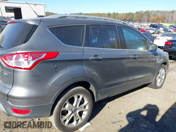2014 Ford Escape Titanium with VIN 1FMCU9J94EUC50534, listed as a IAAI auction lot 41040341 with 115,502 mi miles. Bid and sale history available at carsss.com. Image 12.
