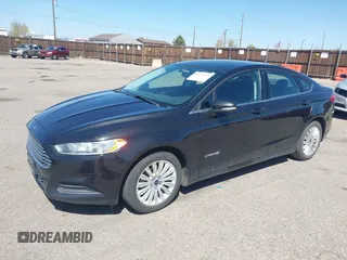 2013 Ford Fusion SE Hybrid with VIN 3FA6P0LUXDR298606, listed as a IAAI auction lot 41976525 with 121,660 mi miles. Bid and sale history available at carsss.com. Image 2.