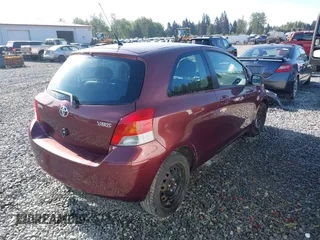 2009 Toyota Yaris with VIN JTDJT903295239611, listed as a IAAI auction lot 42216768 with 122,512 mi miles and . Bid and sale history available at DreamBid. Image 4.