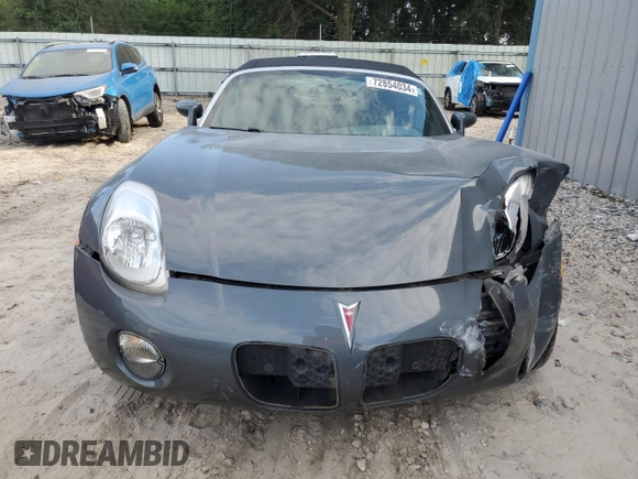 2009 Pontiac Solstice z VIN 1G2MN35B69Y105093, wystawiony jako Copart lot #72854034 z przebiegiem 82 333 mil mil oraz Szkoda całkowita • Salvage title. Historia ofert i sprzedaży dostępna na DreamBid. Obrazek 5.