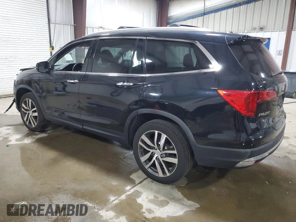 2017 Honda Pilot Touring with VIN 5FNYF6H96HB087634, listed as a Copart auction lot 63535125 with 137,129 mi miles and Salvage title. Bid and sale history available at DreamBid. Image 2.