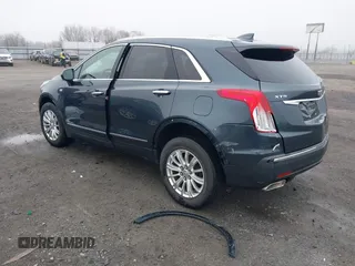 2019 Cadillac XT5 FWD with VIN 1GYKNARS5KZ220134, listed as a IAAI auction lot 41472927 with 58,229 mi miles and . Bid and sale history available at DreamBid. Image 3.