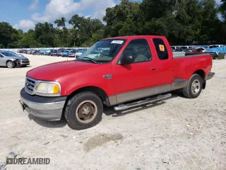 2003 Ford F-150 XL with VIN 1FTRX07WX3KD51374, listed as a Copart auction lot 71796464 with 130,319 mi miles and Salvage Title. Bid and sale history available at carsss.com. Image 1.