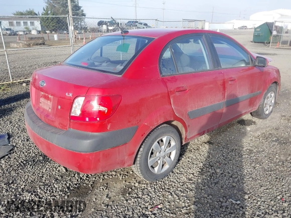 2009 Kia Rio LX with VIN KNADE223796485606, listed as a IAAI auction lot 41676881 with 58,852 mi miles and . Bid and sale history available at DreamBid. Image 4.
