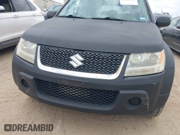 2010 Suzuki Grand Vitara Premium z VIN JS3TE0D22A4101157, wystawiony jako IAAI lot #42231953 z przebiegiem 187 737 mil mil oraz . Historia ofert i sprzedaży dostępna na DreamBid. Obrazek 6.