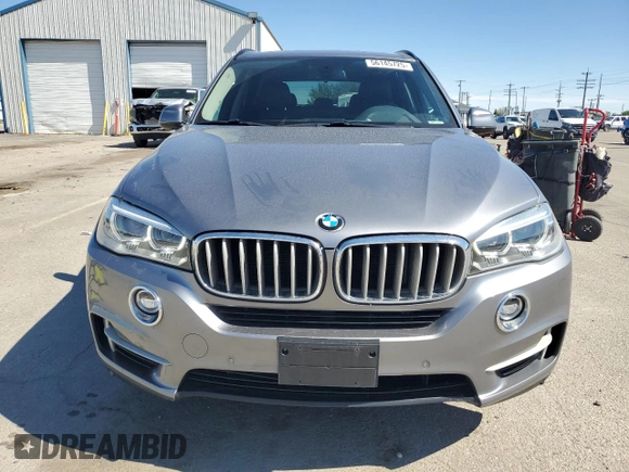 2014 BMW X5 xDrive35i z VIN 5UXKR0C50E0H23037, wystawiony jako Copart lot #56145725 z przebiegiem 82 955 mil mil oraz Szkody całkowita. Historia ofert i sprzedaży dostępna na DreamBid. Obrazek 5.