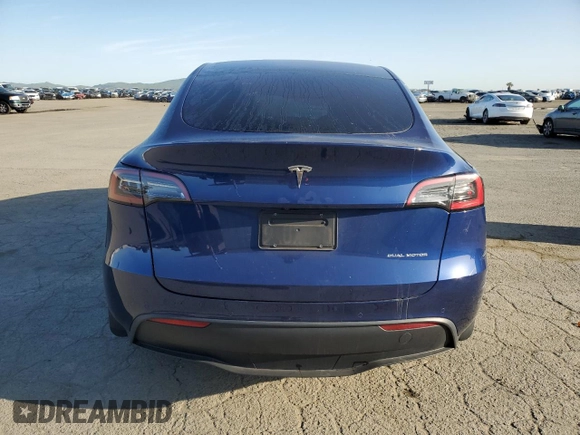 2022 Tesla Model Y Long Range z VIN 7SAYGDEE4NF408202, wystawiony jako Copart lot #51790905 z przebiegiem 43 509 mil mil oraz Szkody całkowita. Historia ofert i sprzedaży dostępna na DreamBid. Obrazek 6.