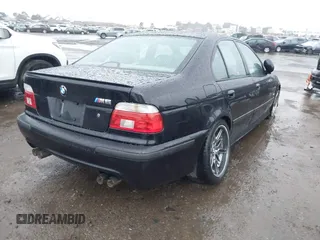 2001 BMW 5 Series with VIN WBSDE93451BZ98389, listed as a IAAI auction lot 41787899 with 86,266 mi miles and . Bid and sale history available at DreamBid. Image 4.