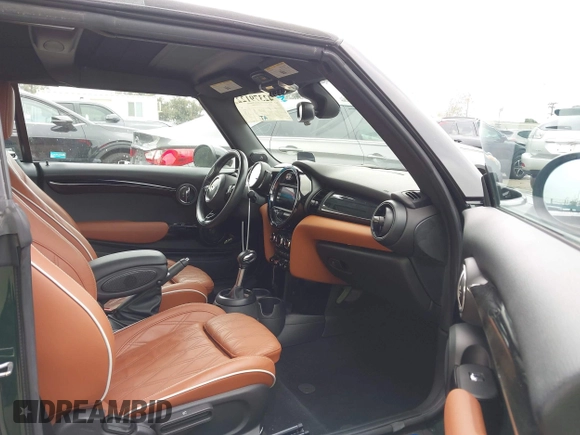 2019 MINI Convertible Cooper S z VIN WMWWG9C5XK3E40620, wystawiony jako IAAI lot #42379122 z przebiegiem 5 496 mil mil oraz . Historia ofert i sprzedaży dostępna na DreamBid. Obrazek 5.