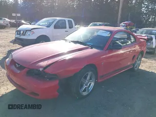 1996 Ford Mustang with VIN 1FALP4042TF180575, listed as a IAAI auction lot 41561882 with 248,183 mi miles. Bid and sale history available at carsss.com. Image 2.