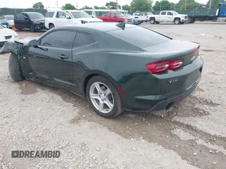 2020 Chevrolet Camaro 1LT with VIN 1G1FB1RX1L0108280, listed as a IAAI auction lot 42167642 with 74,904 mi miles and . Bid and sale history available at DreamBid. Image 3.