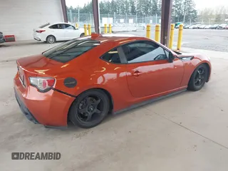 2015 Scion FR-S with VIN JF1ZNAA17F8703357, listed as a IAAI auction lot 41924644 with 62,023 mi miles. Bid and sale history available at carsss.com. Image 4.