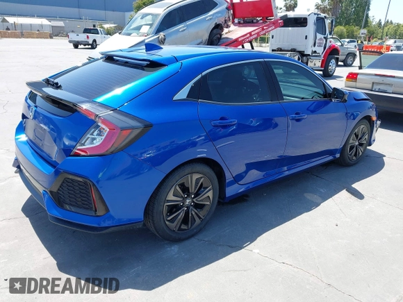 2018 Honda Civic EX with VIN SHHFK7H50JU428018, listed as a IAAI auction lot 42495389 with 71,870 mi miles and . Bid and sale history available at DreamBid. Image 4.