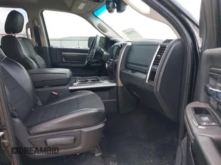 2014 Ram 1500 Sport with VIN 1C6RR7MT6ES233054, listed as a IAAI auction lot 41936407 with 144,759 mi miles and . Bid and sale history available at DreamBid. Image 5.