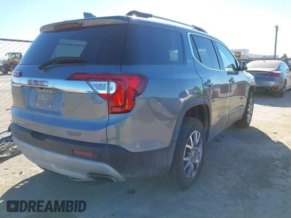 2022 GMC Acadia SLT with VIN 1GKKNMLS5NZ116462, listed as a IAAI auction lot 41195773 with 73,759 mi miles. Bid and sale history available at carsss.com. Image 4.